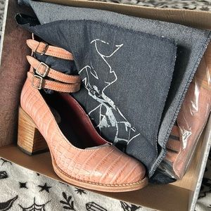 Pink Crocodile Randi. Never been worn.